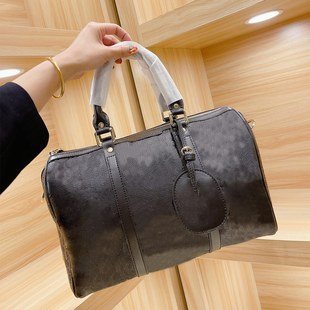 21ss Duffel Bags Travel Bag Women Handbag Made of Cowhide Material Two Colors High Quantity ZZL2104301, Color choose
21ss Duffel Bags Travel Bag Women Handbag Made of Cowhide Material Two Colors High Quantity ZZL2104301, Color choose