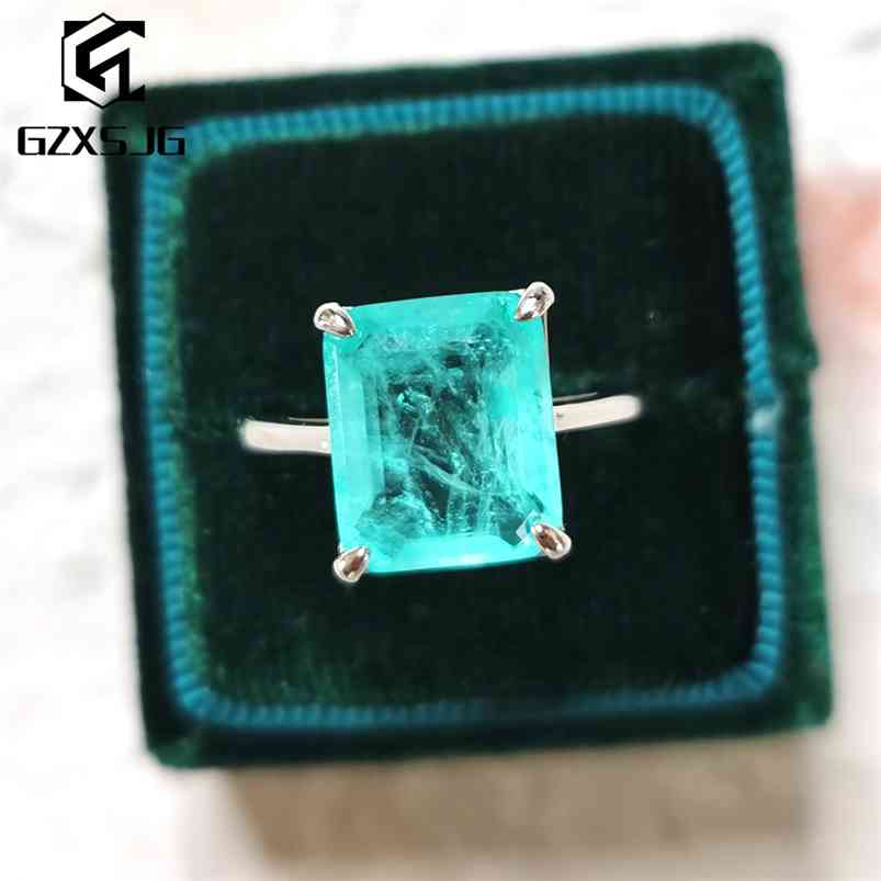 GZXSJG Paraiba Tourmaline Gemstones Ring for Women Solid 925 Sterling Silver 10x12 Emerald cutting stone engagement Fine 210701
GZXSJG Paraiba Tourmaline Gemstones Ring for Women Solid 925 Sterling Silver 10x12 Emerald cutting stone engagement Fine 210701