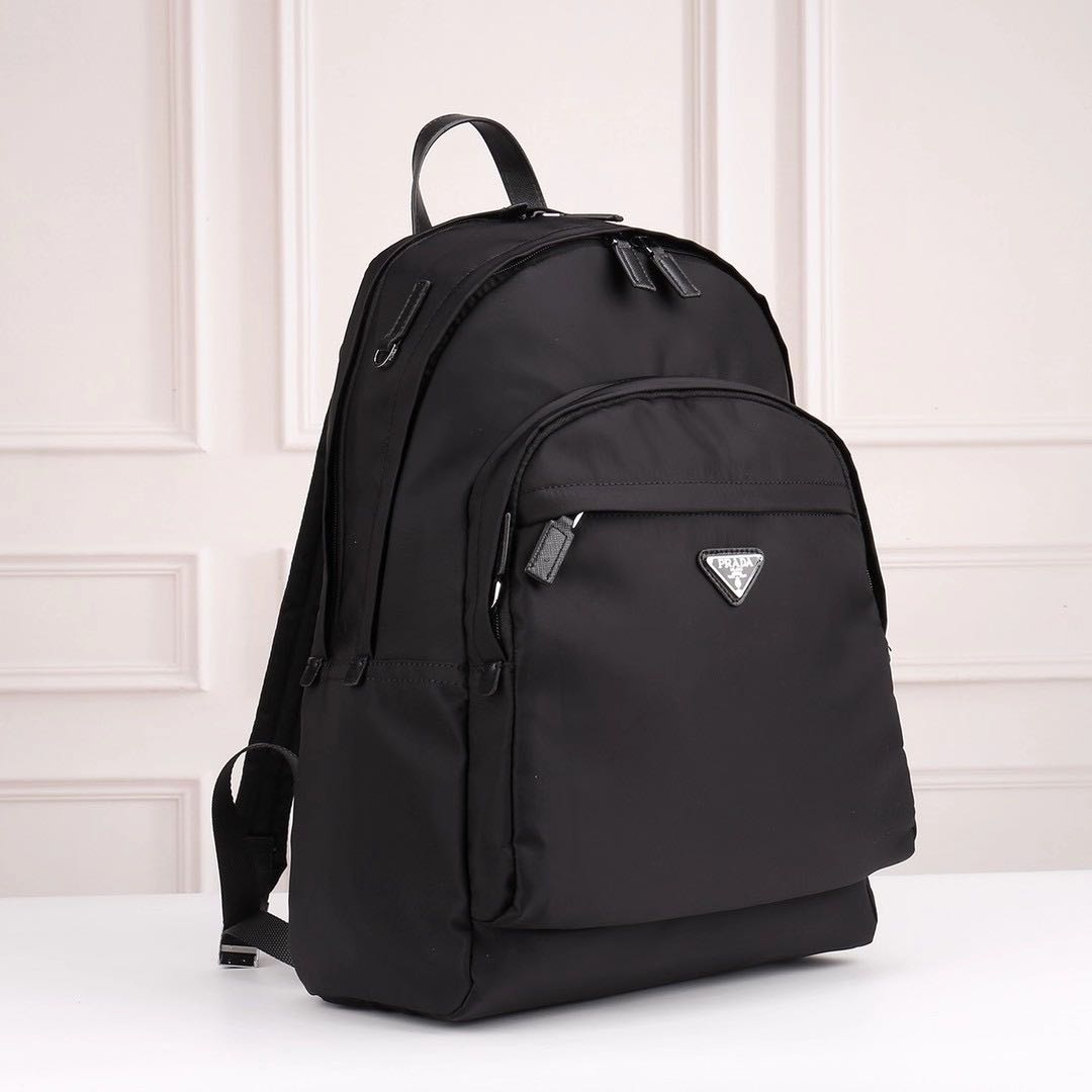 PRADA Wholesale classic waterproof nylon large capacity backpack Oxford fashion retro men's notebook backpack fashion thin travel bag sports mount, Black
PRADA Wholesale classic waterproof nylon large capacity backpack Oxford fashion retro men's notebook backpack fashion thin travel bag sports mount, Black