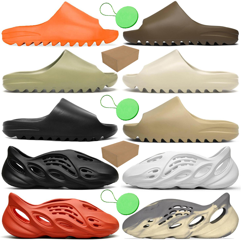 With Box&Tag kanye slides foam runner men women sandal slippers slide sandals Enflame Orange Desert Sand Resin Bone platform mens womens slipper trainers, #10 triple black
With Box&Tag kanye slides foam runner men women sandal slippers slide sandals Enflame Orange Desert Sand Resin Bone platform mens womens slipper trainers, #10 triple black