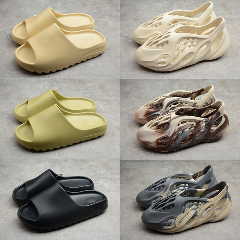 2021 Foam Slippers Kanye Graffiti Desert Sand Triple Black White Resin Slide Sandal MXT Moon Glow Green Men Women Rubber West Runner Slipper
2021 Foam Slippers Kanye Graffiti Desert Sand Triple Black White Resin Slide Sandal MXT Moon Glow Green Men Women Rubber West Runner Slipper