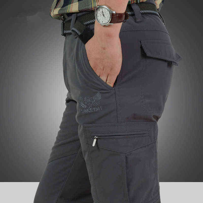 Men Winter Thick Warm Cargo Pants Casual Fleece Pockets Long Trousers Fashion Loose Baggy Jogeer Worker Male Pants 4XL 211112