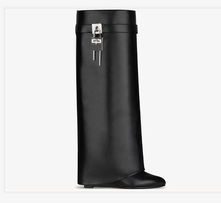 SHARK LOCK Knee boots leather silver and gold finish asymmetrical metal padlock clad wedge almond shaped toe heel height 9cm, Black
SHARK LOCK Knee boots leather silver and gold finish asymmetrical metal padlock clad wedge almond shaped toe heel height 9cm, Black
