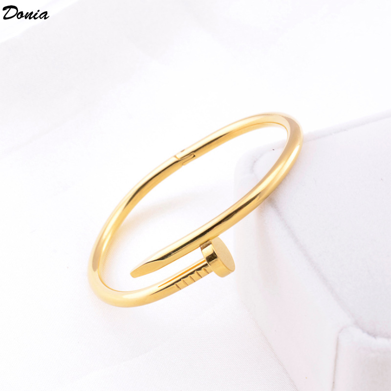 Donia jewelry luxury bangle four-color electroplating European and American fashion exaggerated nail titanium steel bracelet geometric pattern designer
Donia jewelry luxury bangle four-color electroplating European and American fashion exaggerated nail titanium steel bracelet geometric pattern designer