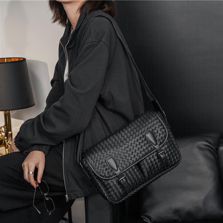 Factory direct men shoulder bags simple and versatile black woven postman bag flip plaid fashion backpack street trend color matching leather handbag