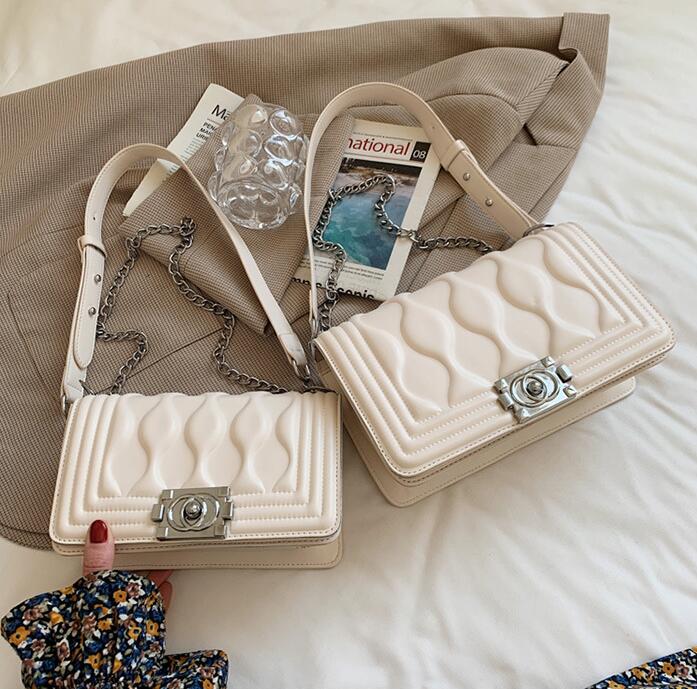 wholesale women handbag simple leather chain bag embossed womens messenger bags in summer Joker solid color portable fashion handbags
wholesale women handbag simple leather chain bag embossed womens messenger bags in summer Joker solid color portable fashion handbags