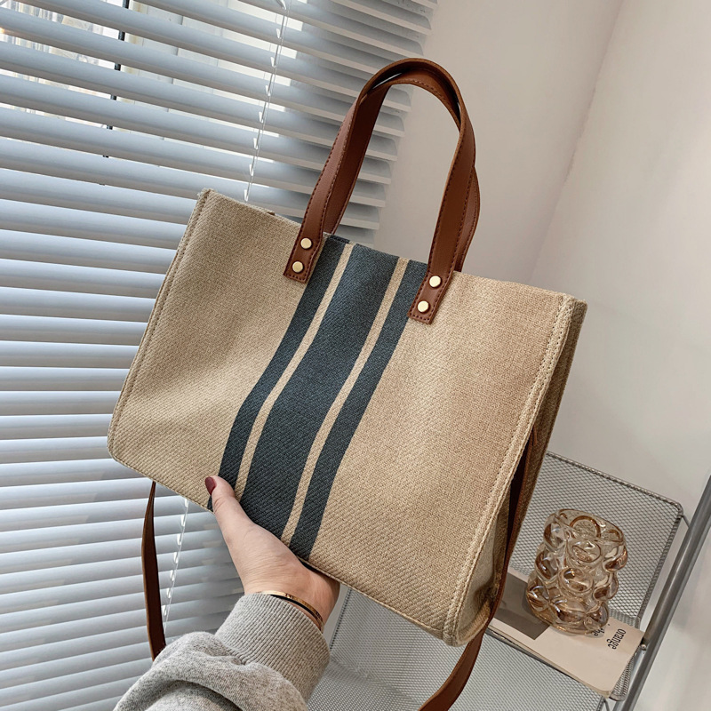 Skorean Women's Hand-held Briefcase Professional Luxurys Commuting Stripe Simple One Shoulder Large Capacity Canvas Bag
Skorean Women's Hand-held Briefcase Professional Luxurys Commuting Stripe Simple One Shoulder Large Capacity Canvas Bag