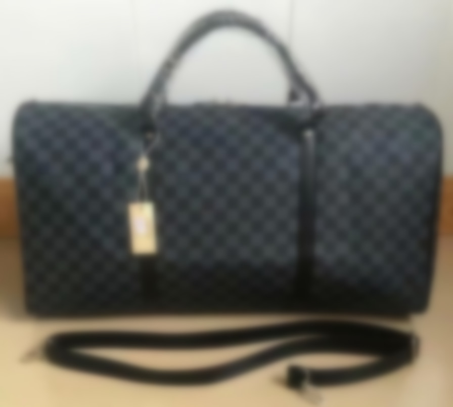 High quality luxury designer duffle bag men travel bags hand luggage pu leather handbags large cross body totes 55cm 004, Same as picture
High quality luxury designer duffle bag men travel bags hand luggage pu leather handbags large cross body totes 55cm 004, Same as picture