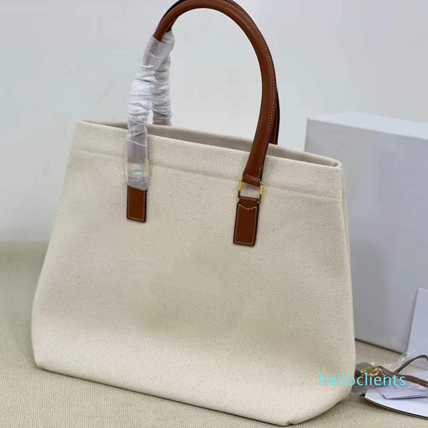 5A+ Duffle bag 21sss Canvas Tote women handbag luxurys designers bags 2021 Genuine Leather shoulder bag classic fashion casual shopping purs, White
5A+ Duffle bag 21sss Canvas Tote women handbag luxurys designers bags 2021 Genuine Leather shoulder bag classic fashion casual shopping purs, White