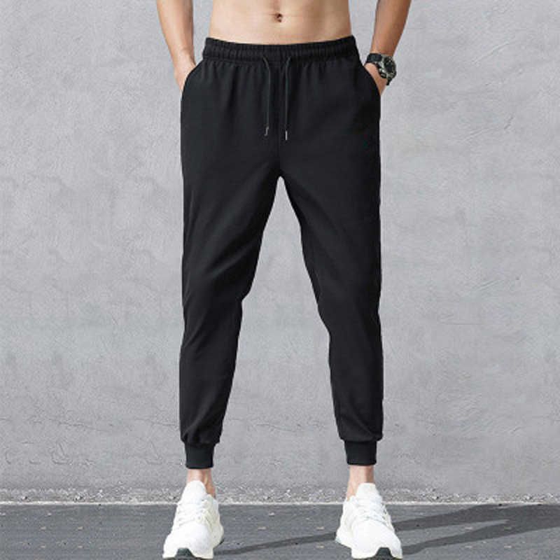 2021New Men's Quick Dry and ice silk Pants Male Summer Breathable Solid Color Slim Trousers Pencil PantsM-5XL Y0811