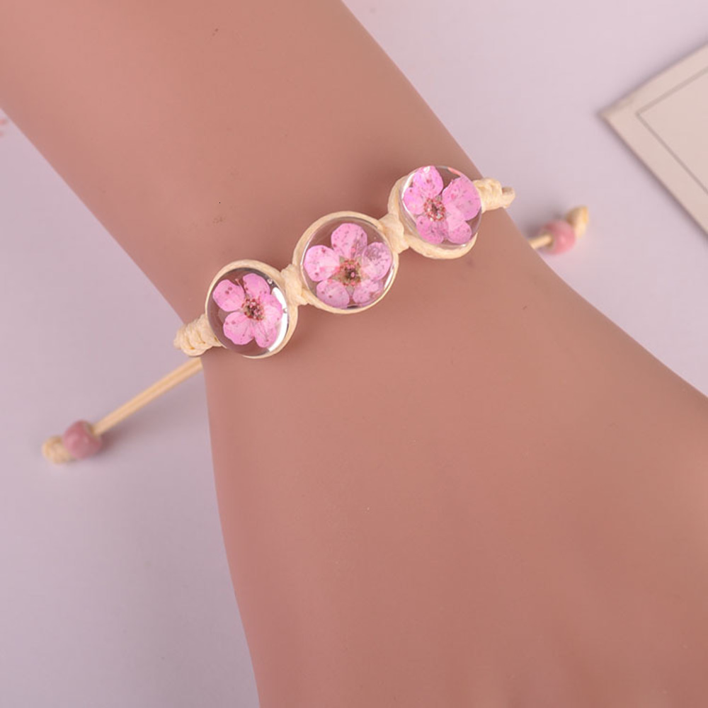 Forest plant peach blossom dried flower bracelet Ornament Glass Ball immortal hand woven real ornament, Golden;silver
Forest plant peach blossom dried flower bracelet Ornament Glass Ball immortal hand woven real ornament, Golden;silver