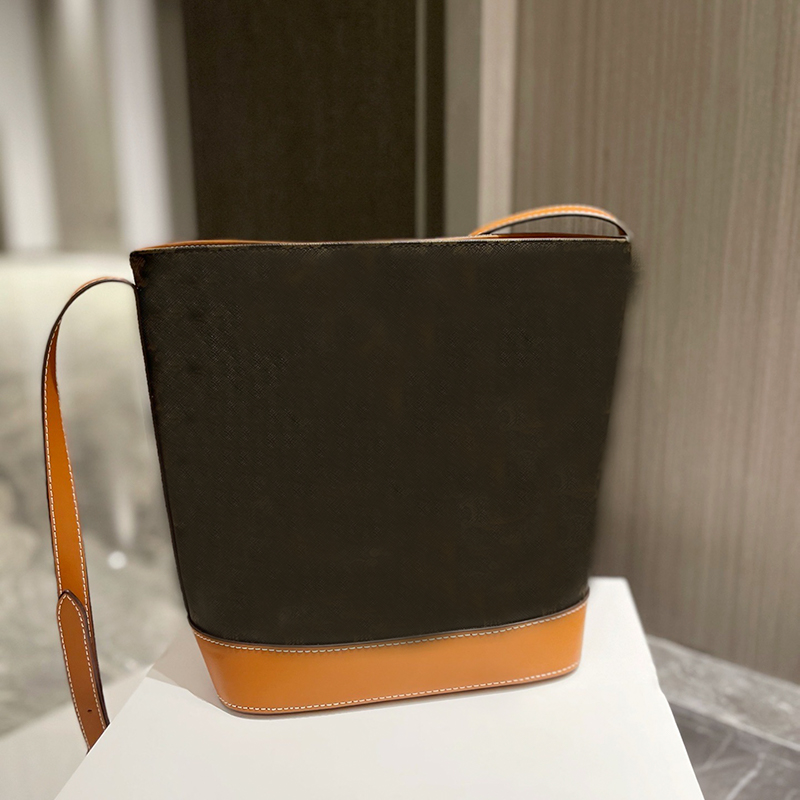 Bucket CUIR TRIOMPHE Bag Canvas Smooth Lady Designers Handbag Leather Bag Crossbody Long Single Shoulder Strap Women Bags Wallet 198243
Bucket CUIR TRIOMPHE Bag Canvas Smooth Lady Designers Handbag Leather Bag Crossbody Long Single Shoulder Strap Women Bags Wallet 198243