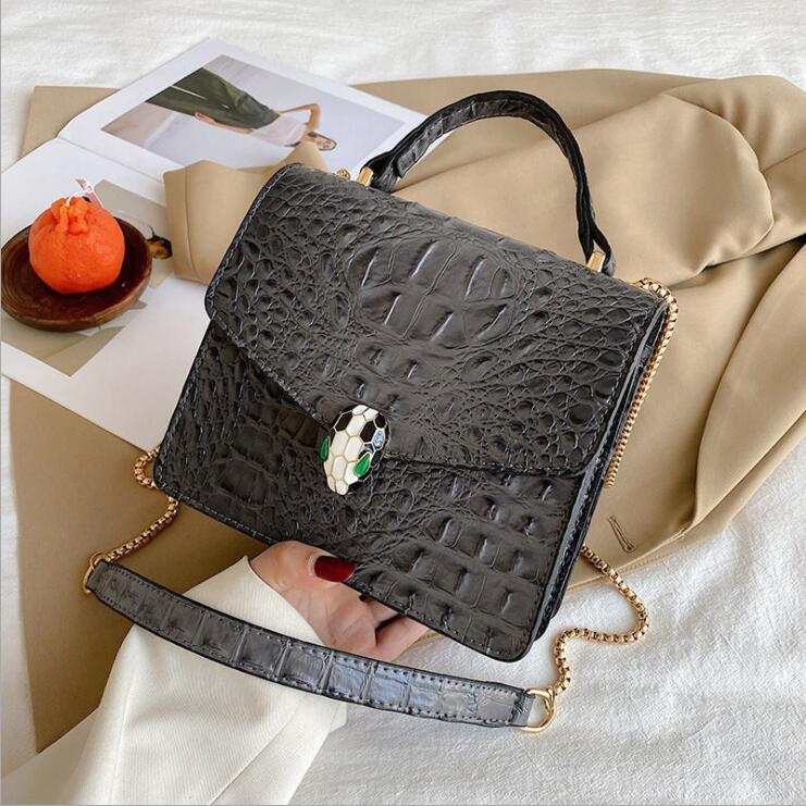 women shoulder bags European elegant solid color leather handbag simple atmospheric pressure flower womens handbags street personality Alligator chain bag
women shoulder bags European elegant solid color leather handbag simple atmospheric pressure flower womens handbags street personality Alligator chain bag