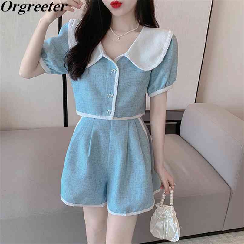 Korean Temperament Sweet Peter pan collar Bow Single breasted Short Wild Shirt high waist Wide leg Shorts Two piece set Women 210602, Sky blue
Korean Temperament Sweet Peter pan collar Bow Single breasted Short Wild Shirt high waist Wide leg Shorts Two piece set Women 210602, Sky blue