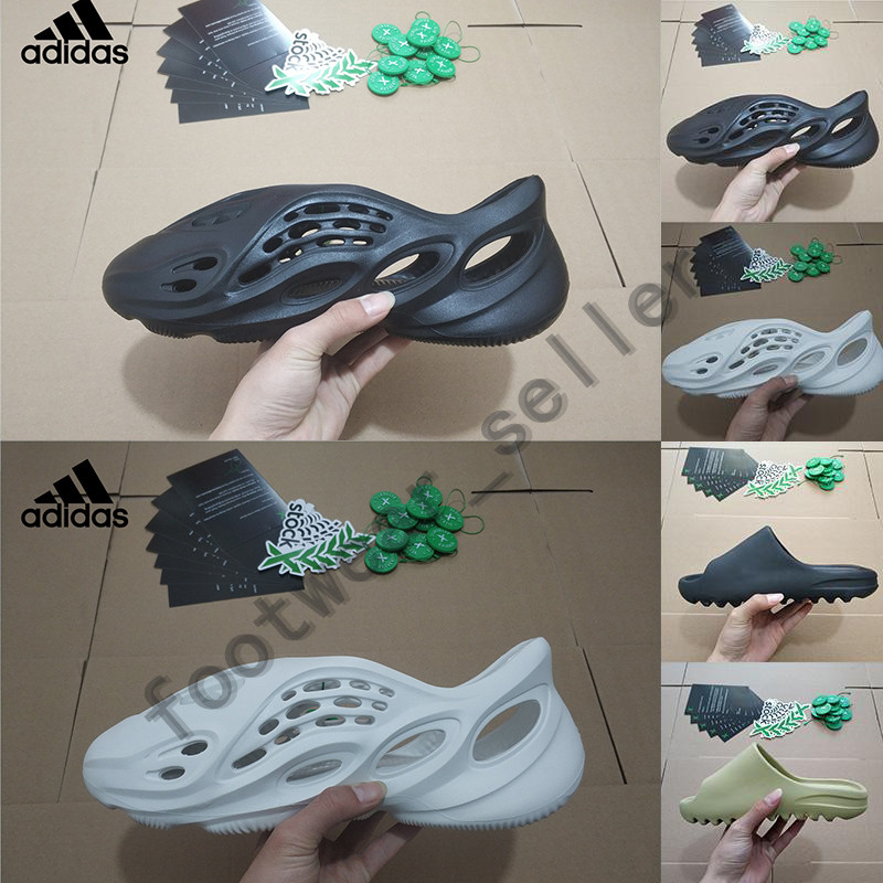 Yeezy Kanye West Slides Sandals Mens Slippers Resin Pure Triple Black Bone Foam Runner Moon Grey Ararat Desert Sage Womens Designer Sandal With Box
Yeezy Kanye West Slides Sandals Mens Slippers Resin Pure Triple Black Bone Foam Runner Moon Grey Ararat Desert Sage Womens Designer Sandal With Box
