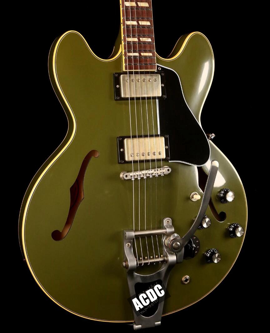 1964 ES 345 Olive Drab Matte Green Semi Hollow Body Jazz Electric Guitar Bigs Tremolo Bridge, Varitone Knobs, Tuilp Tuners, Chrome Hardware
1964 ES 345 Olive Drab Matte Green Semi Hollow Body Jazz Electric Guitar Bigs Tremolo Bridge, Varitone Knobs, Tuilp Tuners, Chrome Hardware