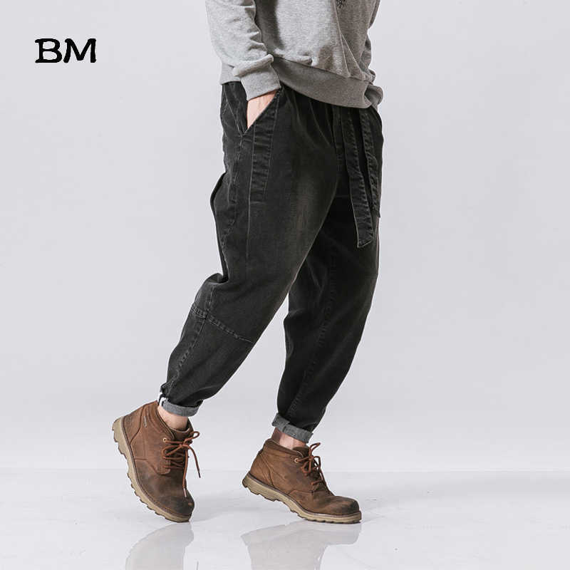 Streetwear High Quality Male Loose Feet Pants Chinese Retro Washed Loose Waist Jeans Harajkuku Baggy Harem Pants Men 5XL 211011