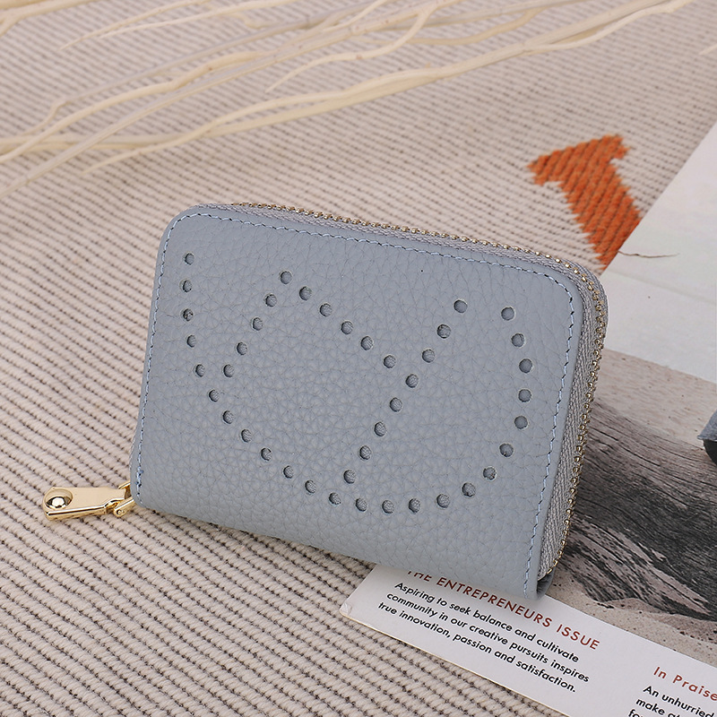 Purse Black Friday Women's top leather laser perforated women's card handbag
Purse Black Friday Women's top leather laser perforated women's card handbag