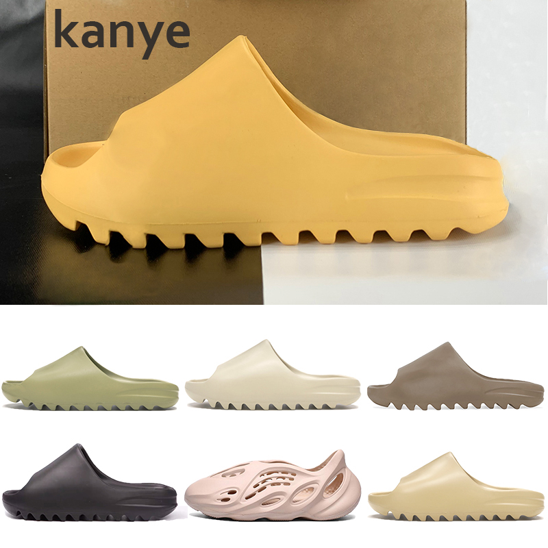 Kanye Sandals Men Women Shoes Slipper Bone White Resin Desert Sand Earth Brown Foam Runner Triple Black White Red Mens Beach Slides
Kanye Sandals Men Women Shoes Slipper Bone White Resin Desert Sand Earth Brown Foam Runner Triple Black White Red Mens Beach Slides