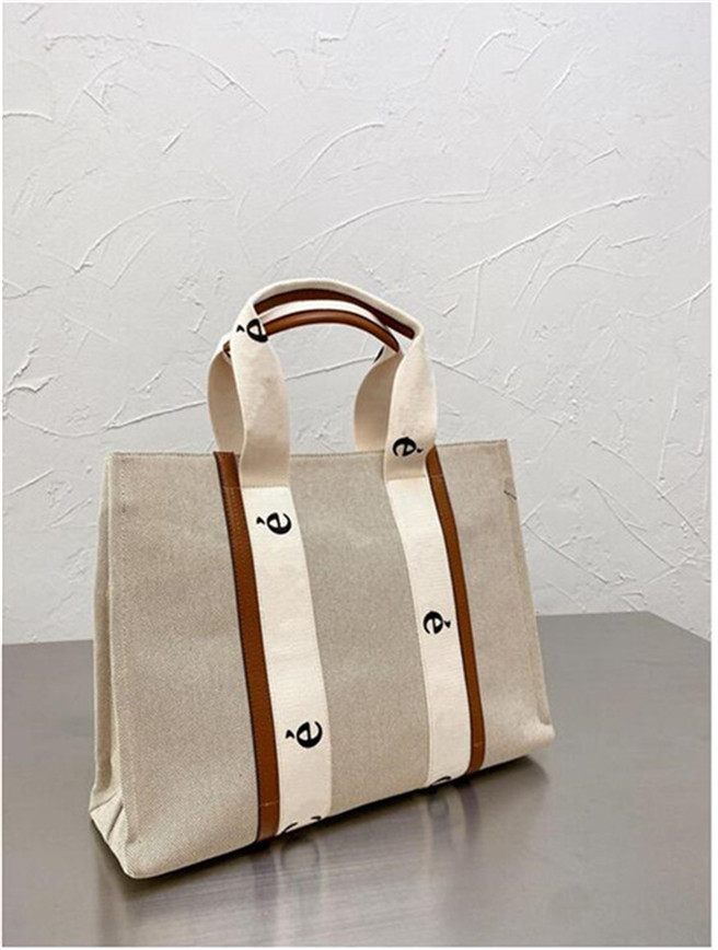 2021 Womens Totes Bags Woody Tote small medium Big Women Handbag Designer Handbags Luxurys Designers Bags Shoulder Bags Crossbody Bag Purses, 21cm
2021 Womens Totes Bags Woody Tote small medium Big Women Handbag Designer Handbags Luxurys Designers Bags Shoulder Bags Crossbody Bag Purses, 21cm