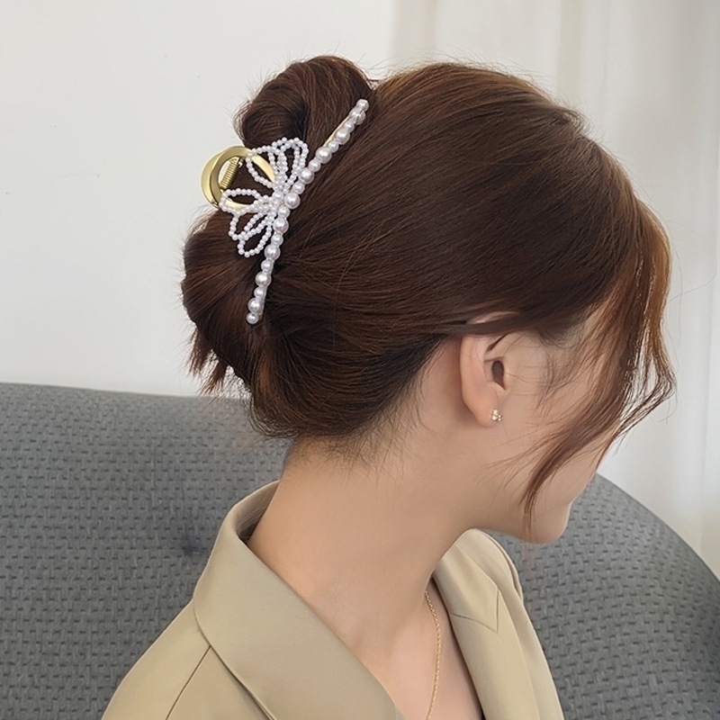 collection of American Gentle and Korean exquisite super immortal temperament sweet grip clip net red pearl bow hairpin
collection of American Gentle and Korean exquisite super immortal temperament sweet grip clip net red pearl bow hairpin