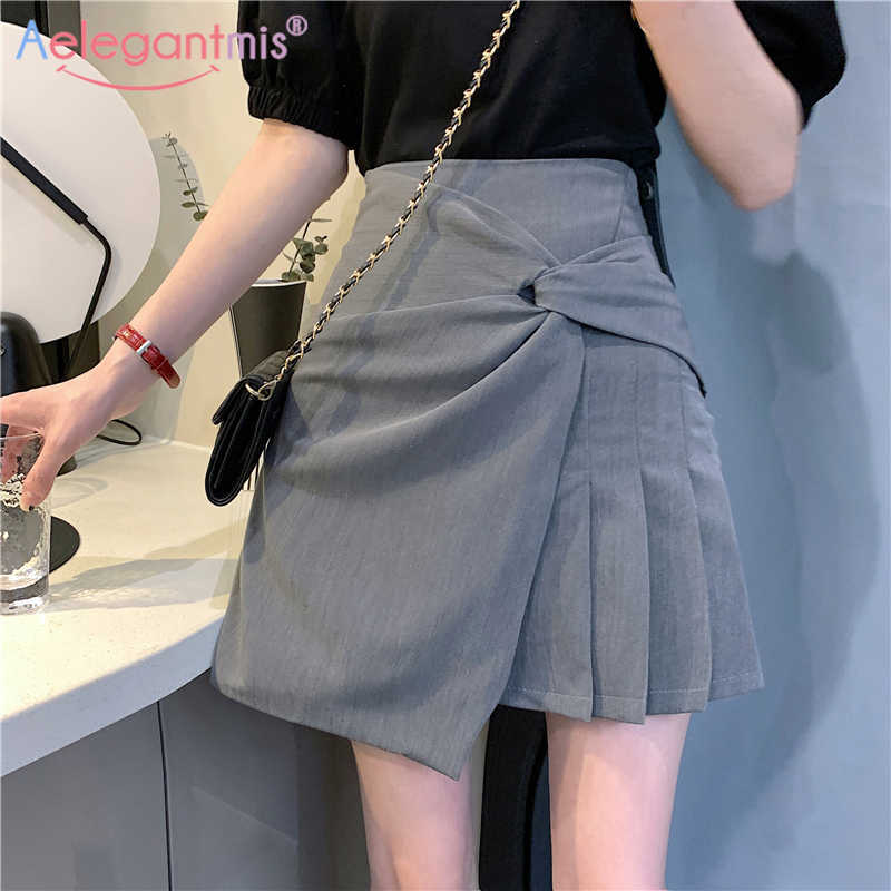 Aelegantmis Korean Casual A Line Pleated Skirt Women High Waist Irregular Solid Mini Female Black Retro Streetwear 210607
Aelegantmis Korean Casual A Line Pleated Skirt Women High Waist Irregular Solid Mini Female Black Retro Streetwear 210607