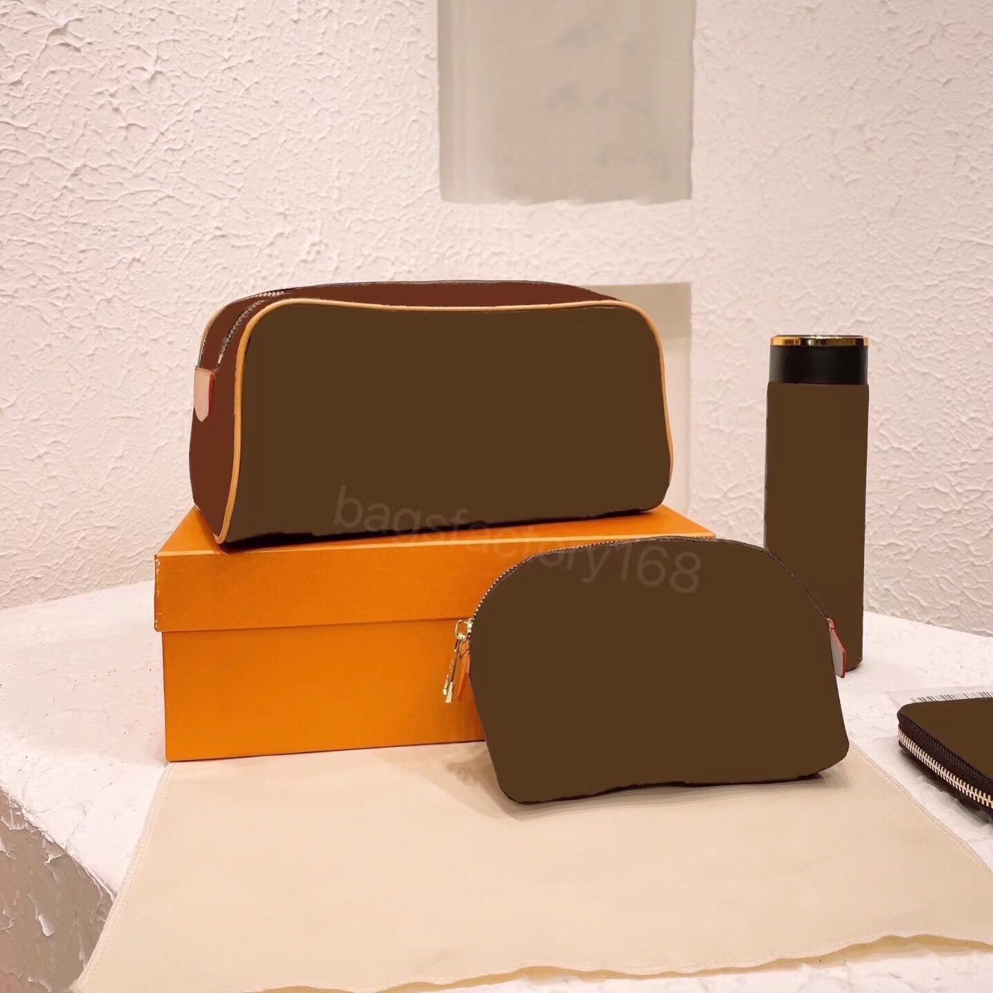 Fashion travel portable combination makeup bag water cup card bags set lady essential handbag storage package classic letter printingpackages wholesale, Customize
Fashion travel portable combination makeup bag water cup card bags set lady essential handbag storage package classic letter printingpackages wholesale, Customize