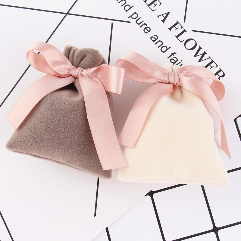 

Gift Wrap 50pcs 7x9cm Jewelry Velvet Bags With Ribbon Candy Beads Hairpin Packing Drawstring Flannel Pouches Christmas Wedding Decor