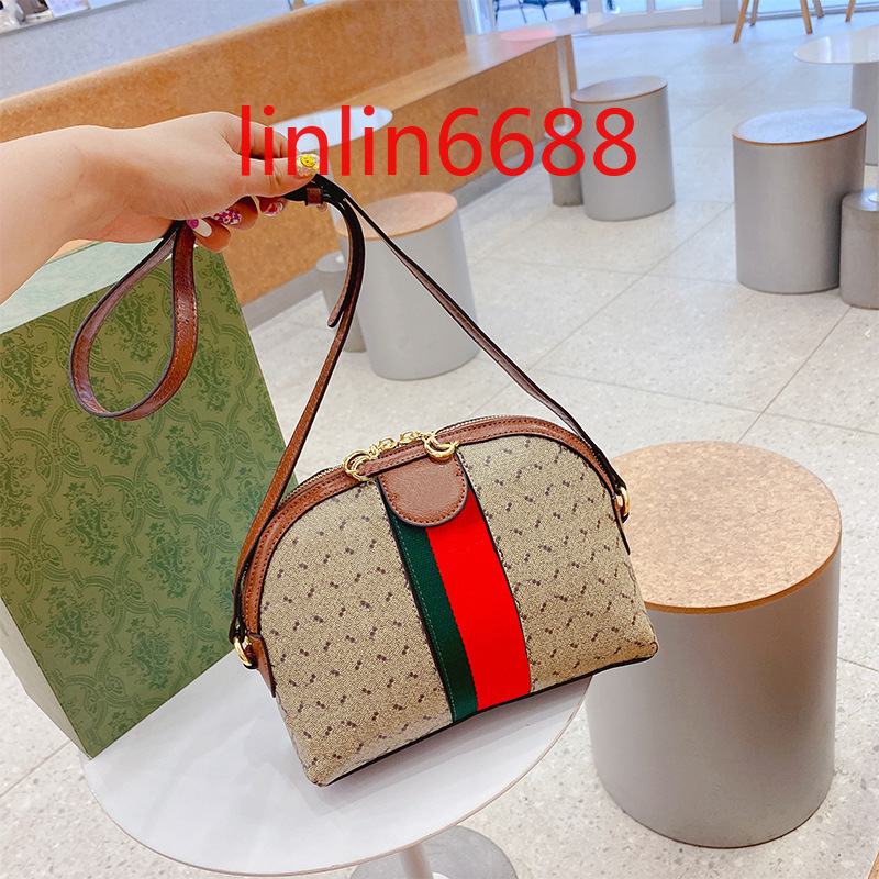 High quality shell bag with logo women's new fashion Korean version ins fashionable leisure shoulder bags with simple texture and foreign style messenger handbags, Size:23×8×18cm
High quality shell bag with logo women's new fashion Korean version ins fashionable leisure shoulder bags with simple texture and foreign style messenger handbags, Size:23×8×18cm