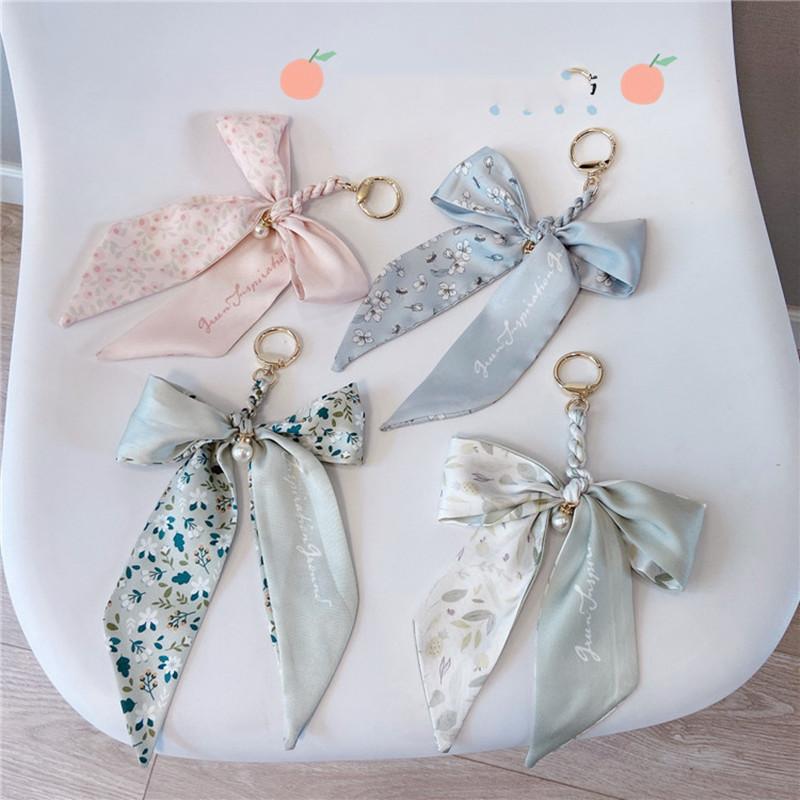 Keychains Arrival Silk Scarf Bow Keychain Creative Pearl Ribbon Bowtie Cute Bag Pendant Car Key Ring Female
Keychains Arrival Silk Scarf Bow Keychain Creative Pearl Ribbon Bowtie Cute Bag Pendant Car Key Ring Female