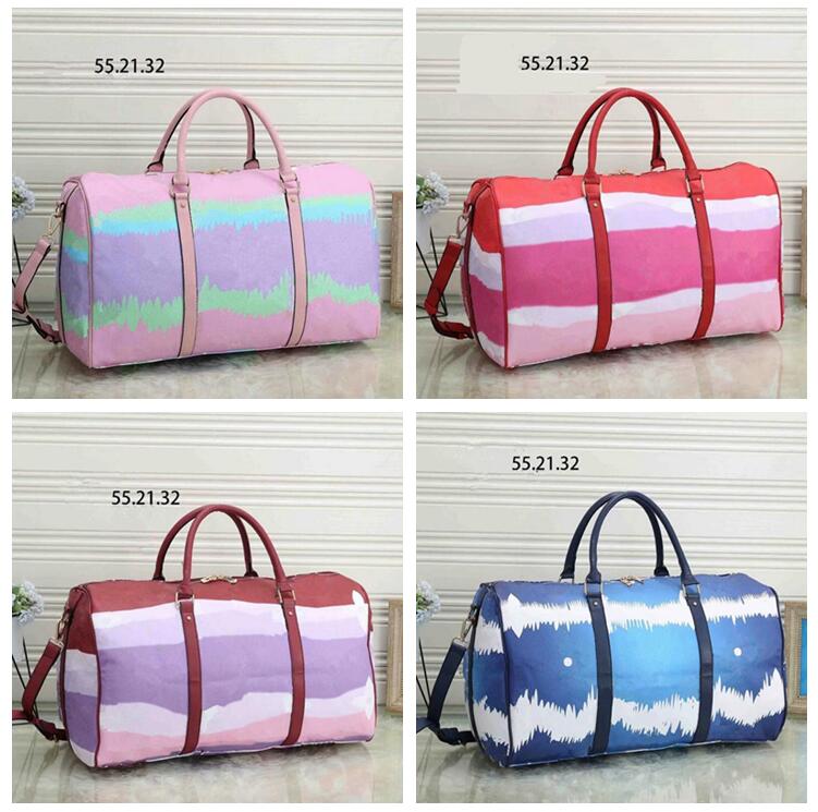 55CM large capacity duffel bags women men travel bag hotes sale quality shoulder carry on luggage bottom rivets hote handbag 204
55CM large capacity duffel bags women men travel bag hotes sale quality shoulder carry on luggage bottom rivets hote handbag 204