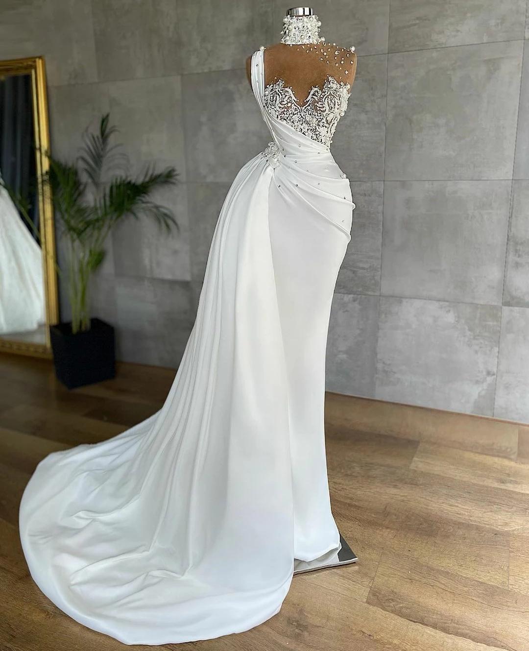 Amazing 2021 Arabic Aso Ebi Mermaid Evening Dresses Luxurious Pearls Beaded High Neck Illusion Top Prom Party Gowns Lace Appliques Peplum Ruched Vesti