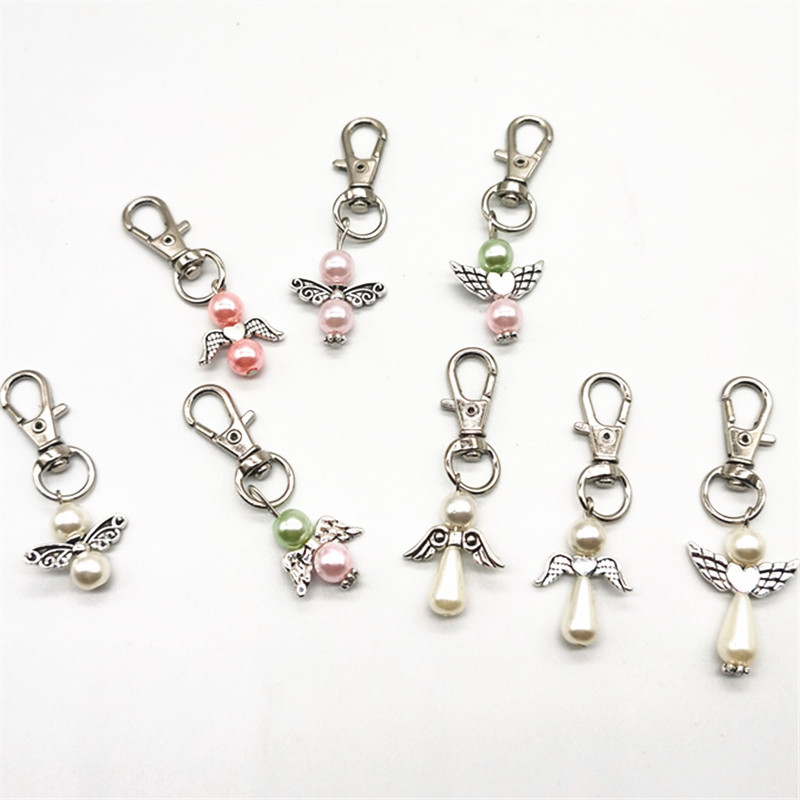 Vintage Pearl Angel Keychains Charm Wing Pendant Keychain Suitable Gift for Wedding Supplies, Christian Baptism
Vintage Pearl Angel Keychains Charm Wing Pendant Keychain Suitable Gift for Wedding Supplies, Christian Baptism