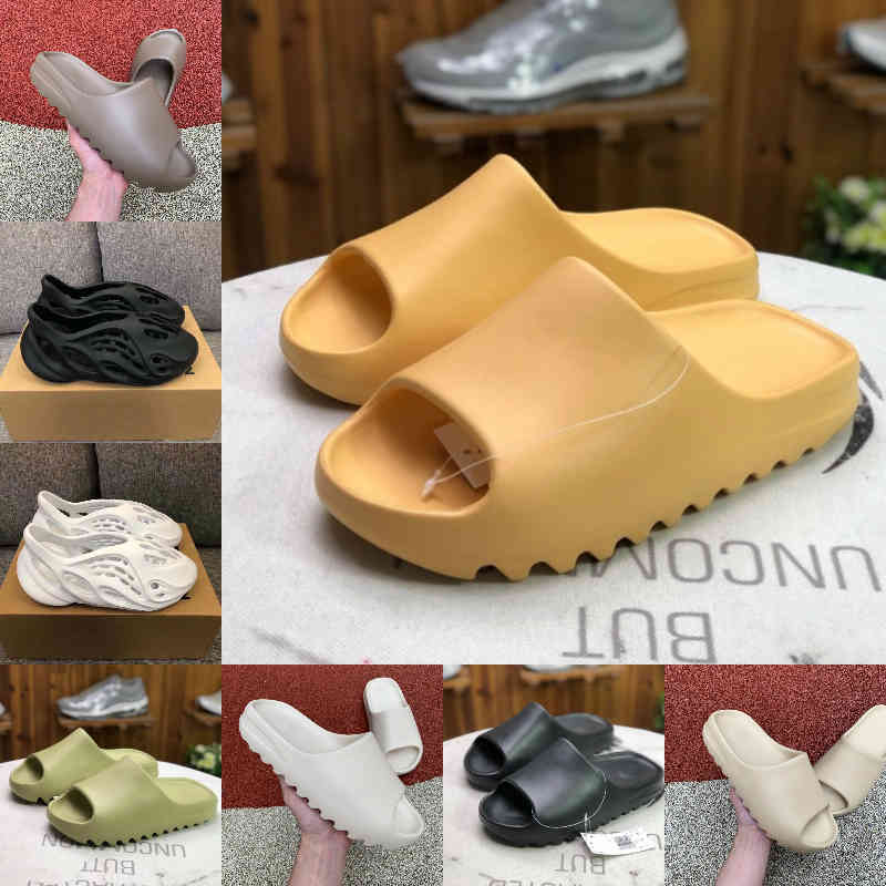 Wholesale New Kanyes Wests Slipper Men Women Slide Bone Earth Brown Desert Sand Slide Resin Fashion Shoes Sandals Foam Runner Trainers Size 36-45 F12, G203
Wholesale New Kanyes Wests Slipper Men Women Slide Bone Earth Brown Desert Sand Slide Resin Fashion Shoes Sandals Foam Runner Trainers Size 36-45 F12, G203