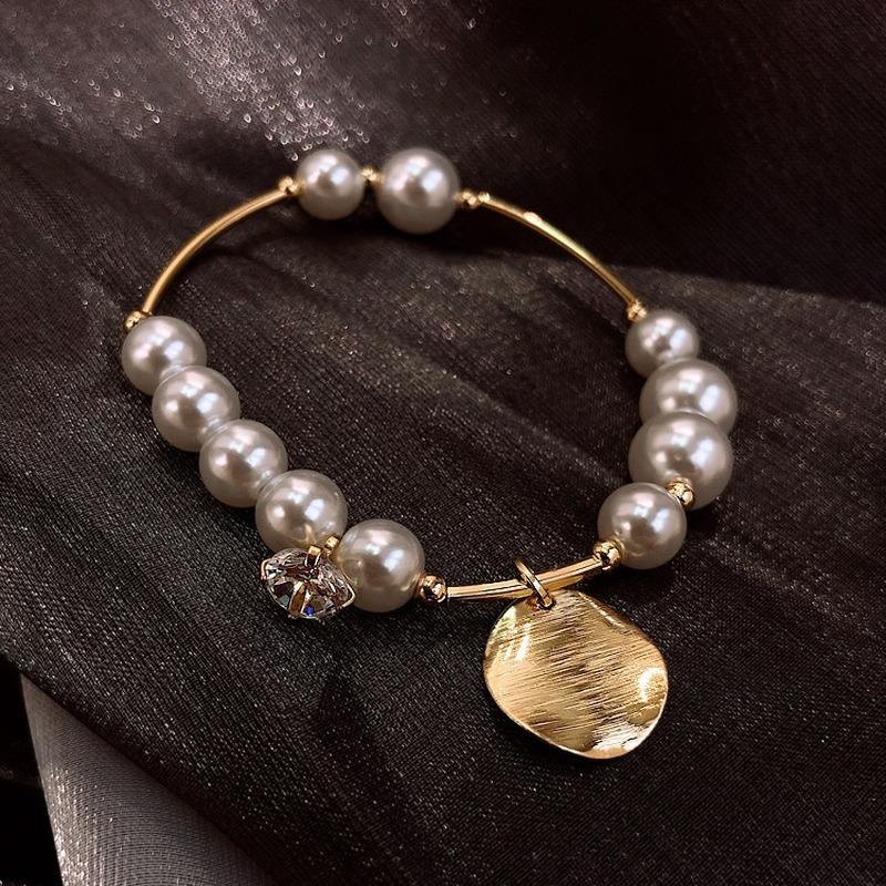 Charm Bracelets U-Magical Temperament Gold Circle Geometrical Imitation Pearl Bracelet For Women Textured Asymmetry Jwellery
Charm Bracelets U-Magical Temperament Gold Circle Geometrical Imitation Pearl Bracelet For Women Textured Asymmetry Jwellery