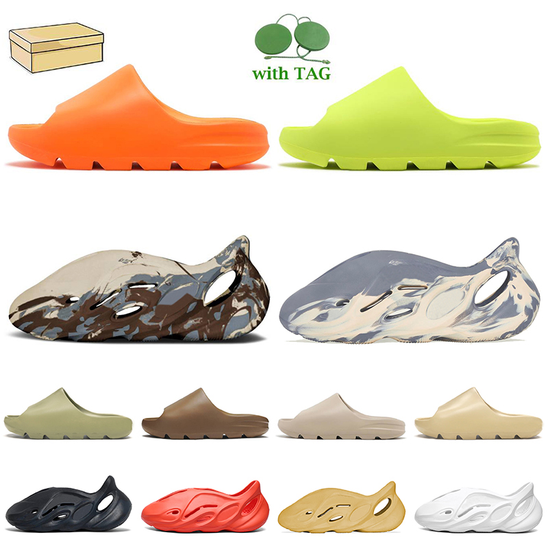 Fashion Summer Women Men Designer Slippers EVA Slides Enflame Orange Glow Green Pure Core Soot Resin Sandals Mineral Blue Moon Gray Cream Clay Slipper Slide Eur 36-47, Box
Fashion Summer Women Men Designer Slippers EVA Slides Enflame Orange Glow Green Pure Core Soot Resin Sandals Mineral Blue Moon Gray Cream Clay Slipper Slide Eur 36-47, Box