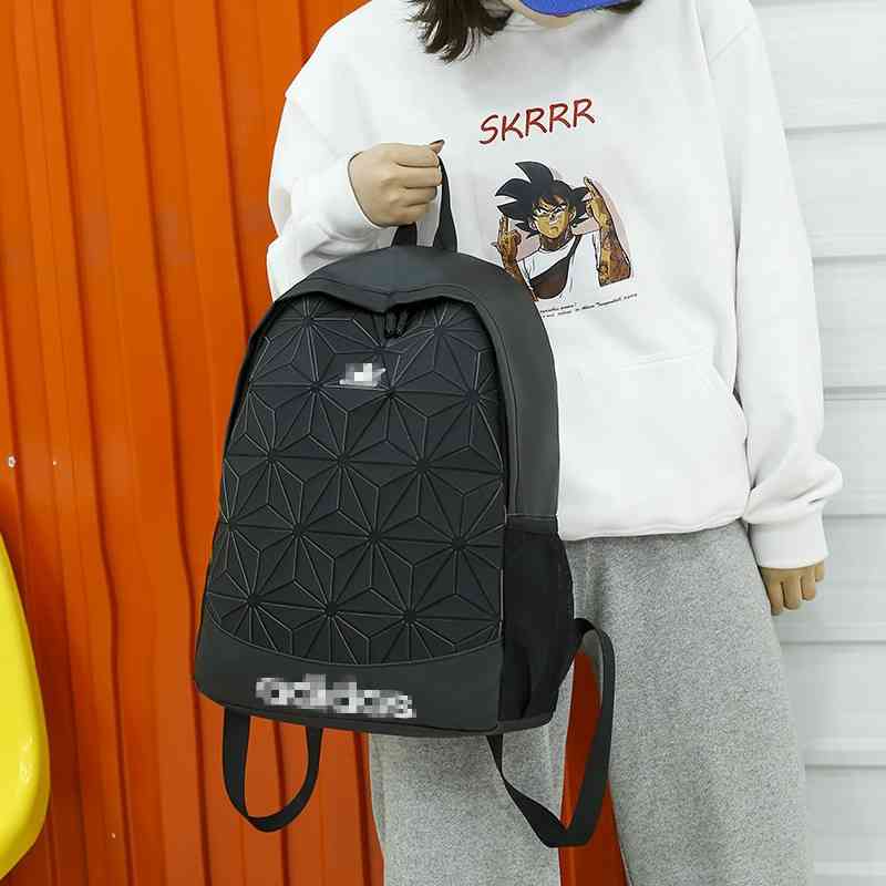 New net red school Korean high school backpack male and female geometric diamond student laser leisure bag
New net red school Korean high school backpack male and female geometric diamond student laser leisure bag