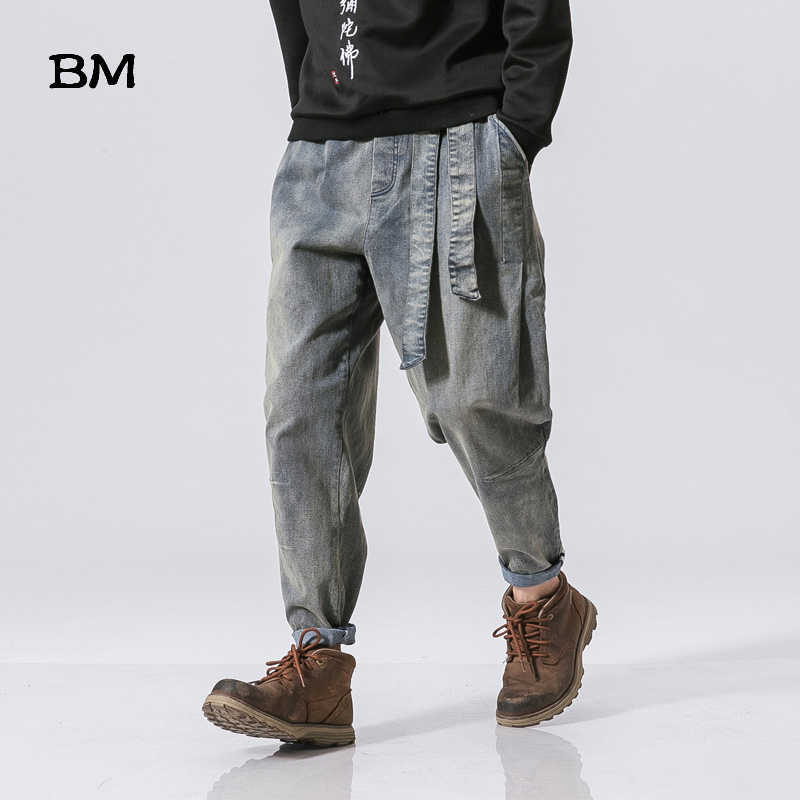 Streetwear High Quality Male Loose Feet Pants Chinese Retro Washed Loose Waist Jeans Harajkuku Baggy Harem Pants Men 5XL 211011