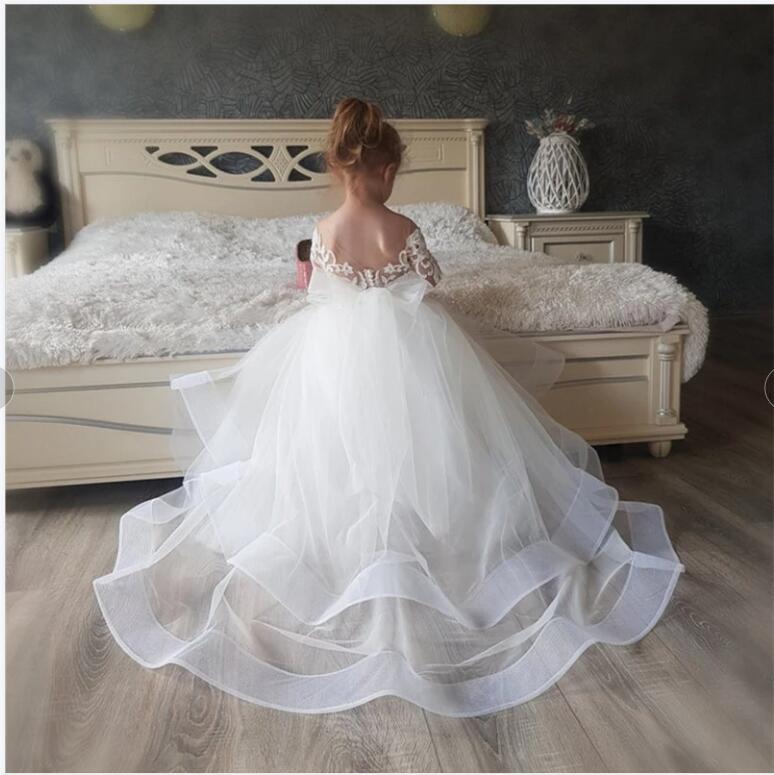 Cute Floer Girls Dresses White Lace Appliques Tulle Jeel Neck Long Sleeves Seep Train Birthday Communion Children Girl Pageant Gons Open Back Tiered