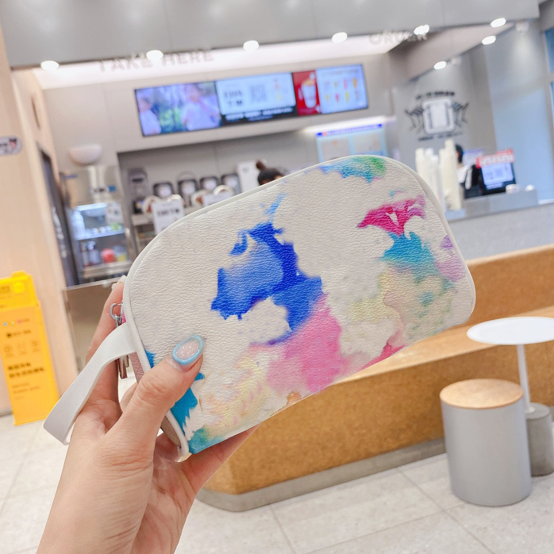 Luxury designer wallet graffiti cosmetic bag female large-capacity portable multi-use travel toiletry bags ladies coin purse
Luxury designer wallet graffiti cosmetic bag female large-capacity portable multi-use travel toiletry bags ladies coin purse