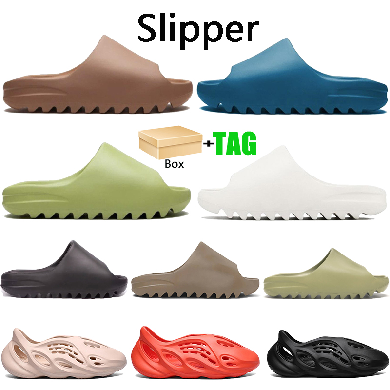 With box Fashion foam runner slipper Slides shoes resin bone Dark blue triple white Earth Brown soot men women sandals sneakers
With box Fashion foam runner slipper Slides shoes resin bone Dark blue triple white Earth Brown soot men women sandals sneakers