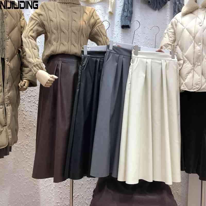 Women Solid Pu Leather Skirts with Pockets Autumn Winter High Waist Folds A-Line Mid Calf Skirt Female 210514