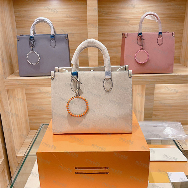 Top quality Genuine leather Bag ONTHEGO Women's men tote crossbody Luxury Designer fashion shopping wallet card pockets handbag Shoulder Bags original single purse, Carton
Top quality Genuine leather Bag ONTHEGO Women's men tote crossbody Luxury Designer fashion shopping wallet card pockets handbag Shoulder Bags original single purse, Carton