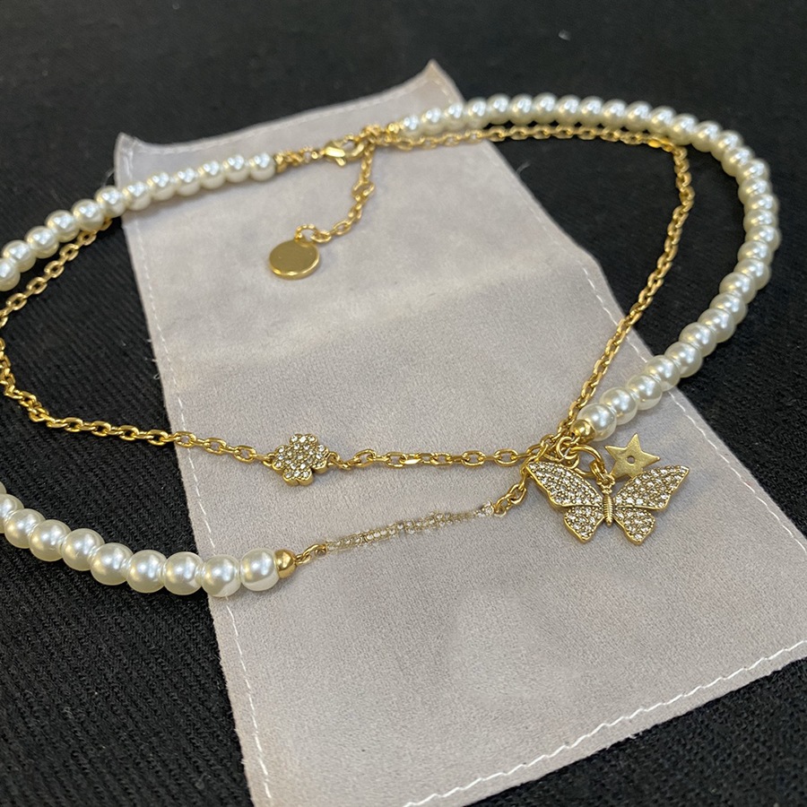 L-D16 Luxury Designer Necklaces butterfly Clover Pendant Double pearl necklace Party gifts High Quality Yellow Brass, Silver
L-D16 Luxury Designer Necklaces butterfly Clover Pendant Double pearl necklace Party gifts High Quality Yellow Brass, Silver
