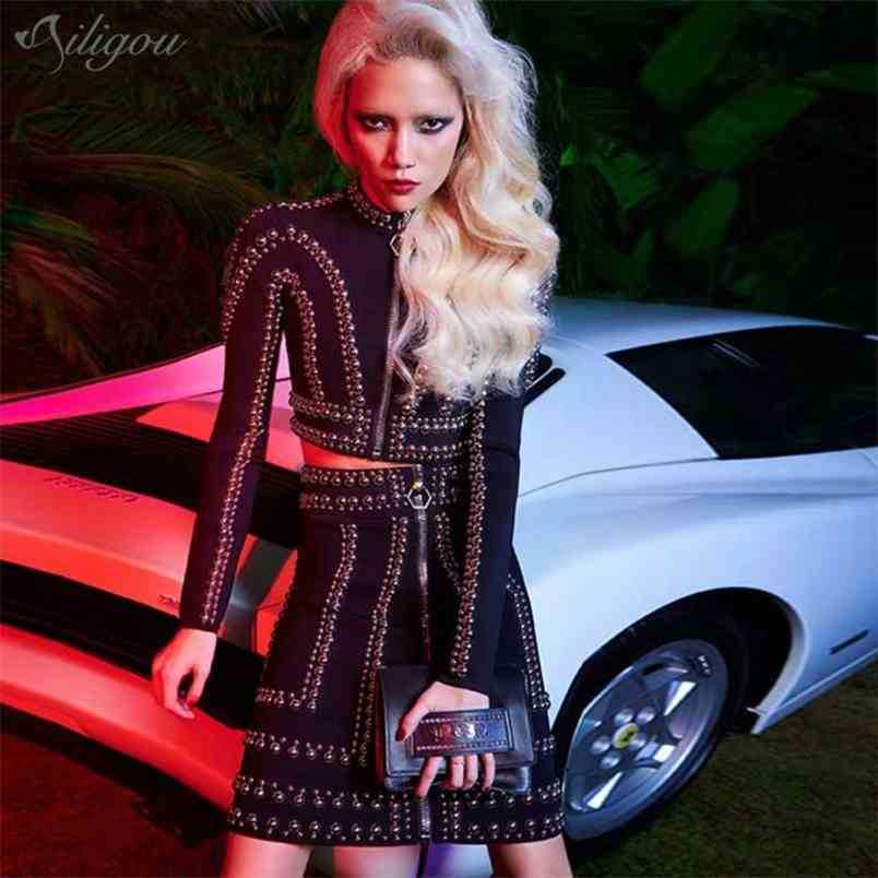 Designer Rivet Two-Piece Women' Short Long-Sleeved Top High Waist A-Line Skirt Fashionable Summer Black Set 210525
Designer Rivet Two-Piece Women' Short Long-Sleeved Top High Waist A-Line Skirt Fashionable Summer Black Set 210525