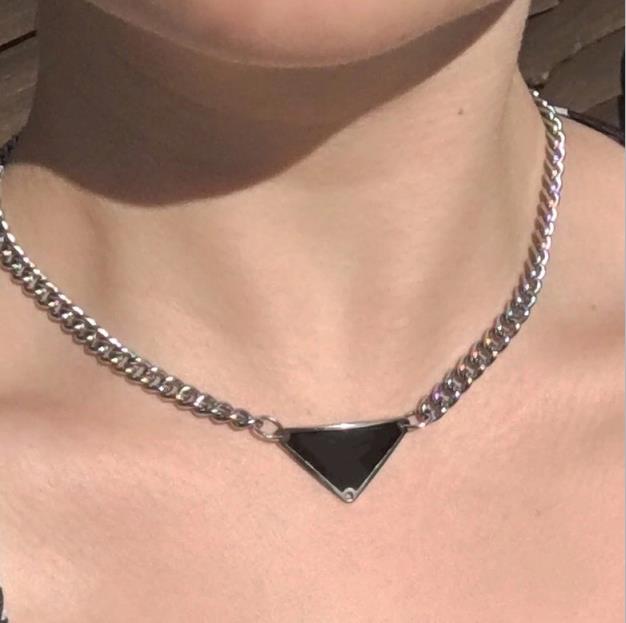 Fashion white pink triangle Necklace metal letter label pendant Street hip hop personality classic men's and women's necklaces
Fashion white pink triangle Necklace metal letter label pendant Street hip hop personality classic men's and women's necklaces