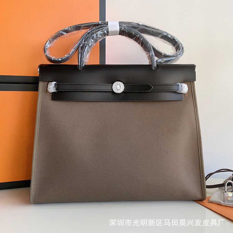 Fashion handbag designer bag Herbag 31cm19cm waterproof canvas with cowhide one shoulder cross carry Pegasus, Black
Fashion handbag designer bag Herbag 31cm19cm waterproof canvas with cowhide one shoulder cross carry Pegasus, Black