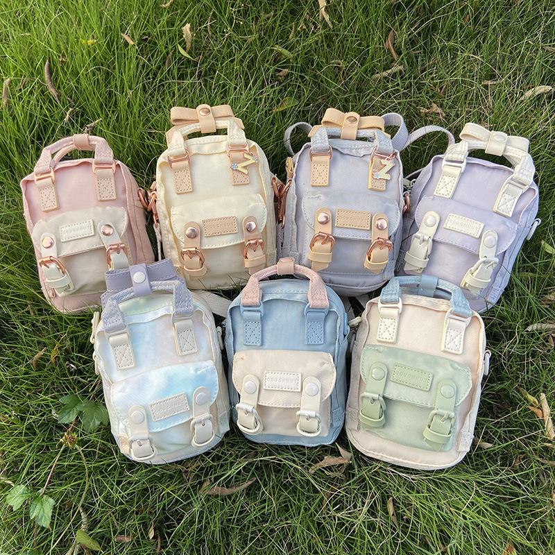 Backpack Donut Mini Messenger Bag Korean Version Of Macaron One-shoulder Campus Students Shoulder Bow Small, A3
Backpack Donut Mini Messenger Bag Korean Version Of Macaron One-shoulder Campus Students Shoulder Bow Small, A3
