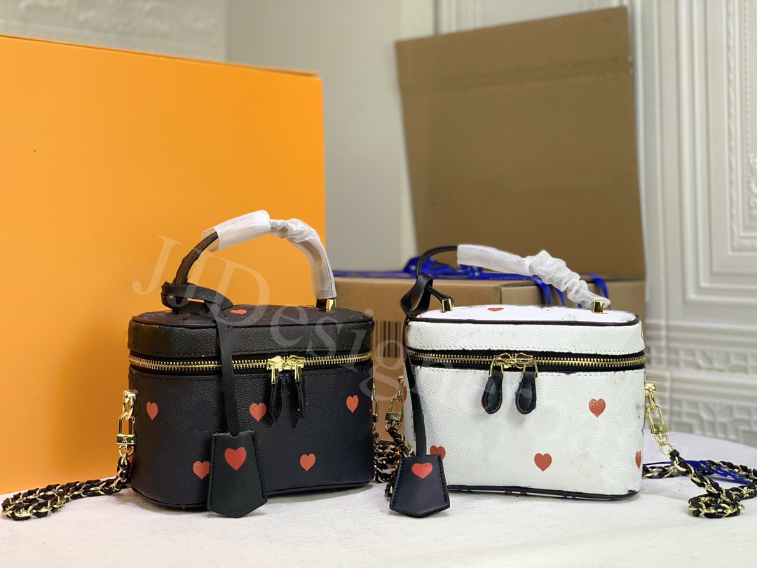 women Leather Tote shoulder Crossbody Cosmetic bags Travel vanity Double zip with padlock closure topstitching adjustable strap handbag bag 2021 designer M57482, Black
women Leather Tote shoulder Crossbody Cosmetic bags Travel vanity Double zip with padlock closure topstitching adjustable strap handbag bag 2021 designer M57482, Black