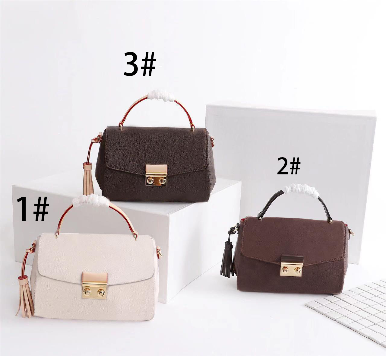 Designer shoulder bag Small, fashionable and casual handbag superior quality CROSS Chessboard pattern Mono Canvas material tassel decoration
Designer shoulder bag Small, fashionable and casual handbag superior quality CROSS Chessboard pattern Mono Canvas material tassel decoration